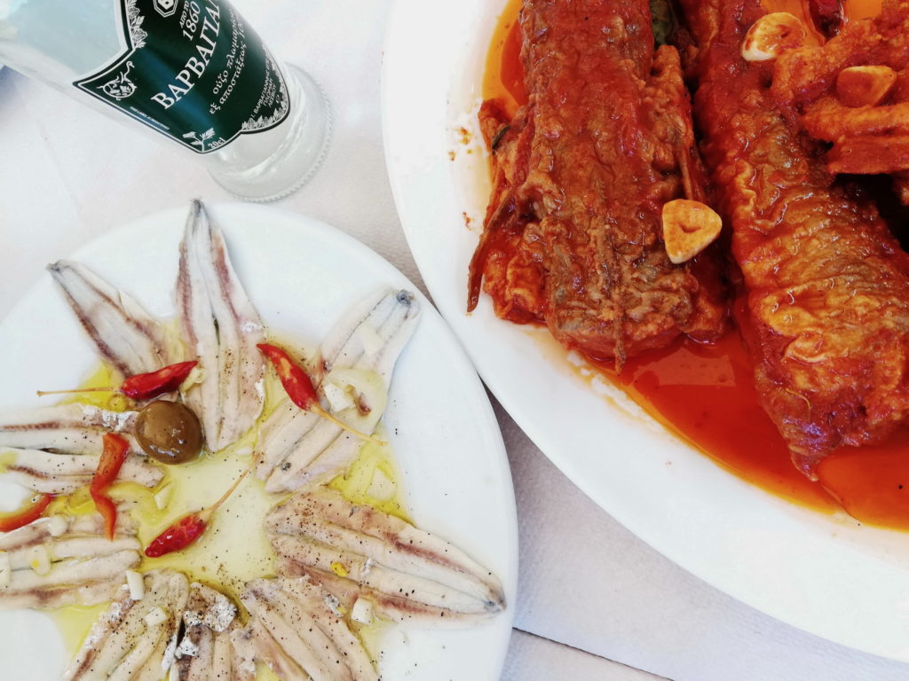 Marinated anchovies and fried fish in tomato garlic sauce are local specialties