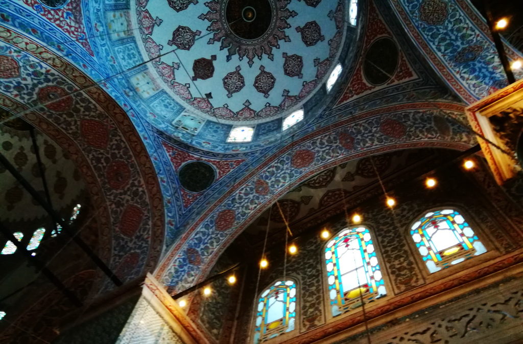 Arabesques and complex geometries decorate the interior of the Blue Mosque