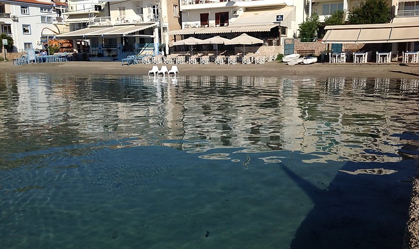 Beach Chairs in the Water at Ormos