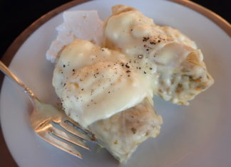 Greek Cabbage Rolls with Avgolemono sauce and feta cheese on the side