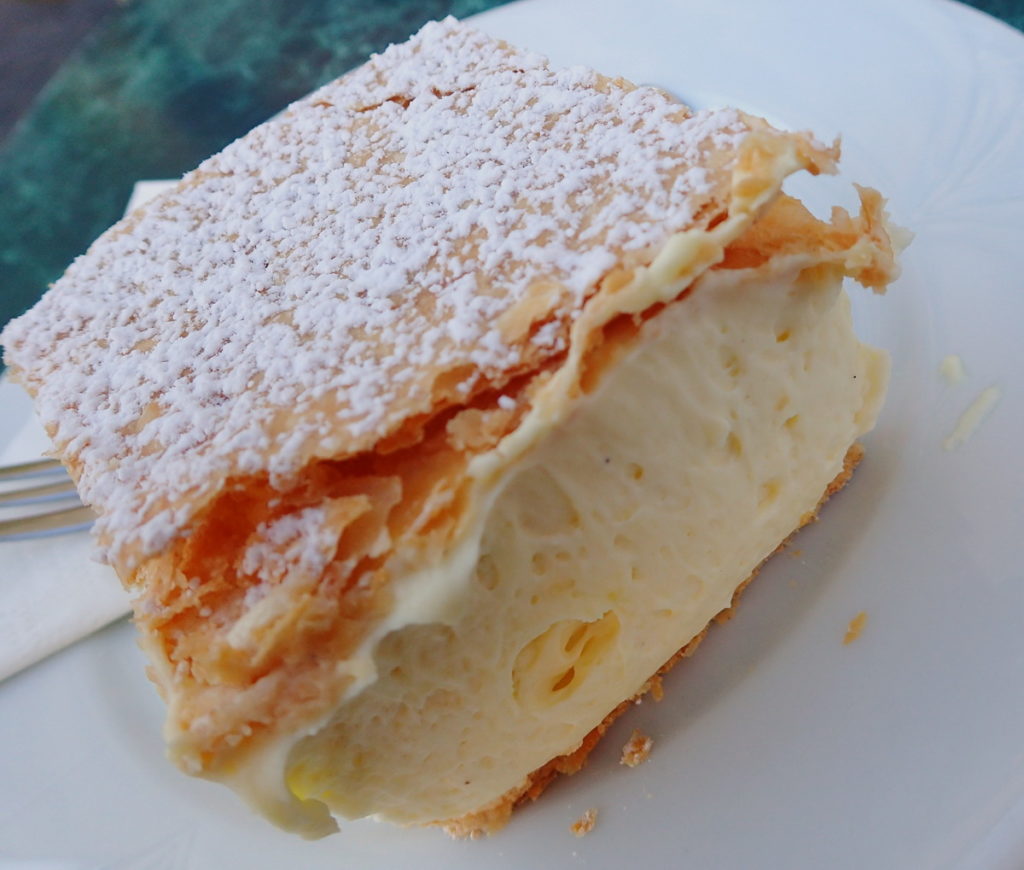 Winter in Budapest is the perfect time to sample rich pastries - A thick square of krémes is one of the most delicious pastries of Budapest. Those from Ruszwurm - like this one - Budapest's oldest confectioner, are perhaps the very finest