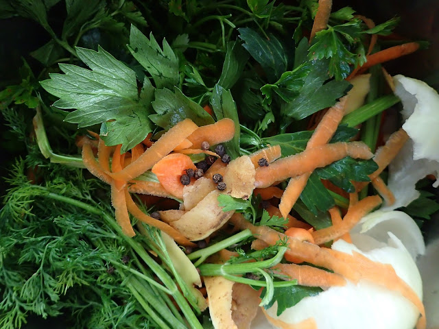 Herbs and peels for a quick stock for psarosoupa