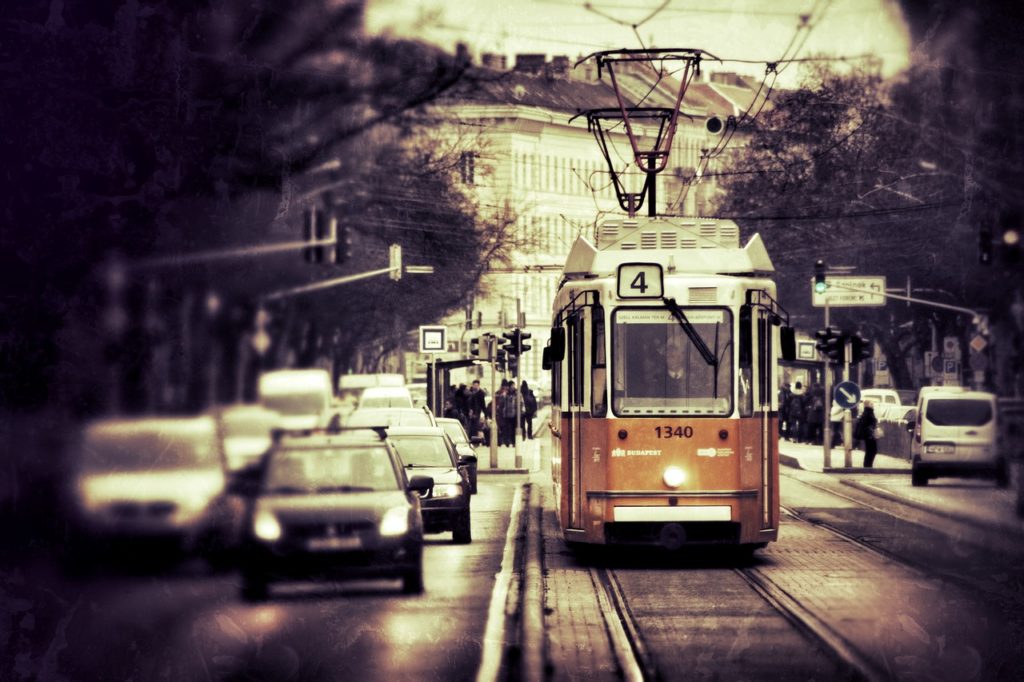 The old-fashioned yellow trams are  stylish and efficient way of getting around in winter in Budapest