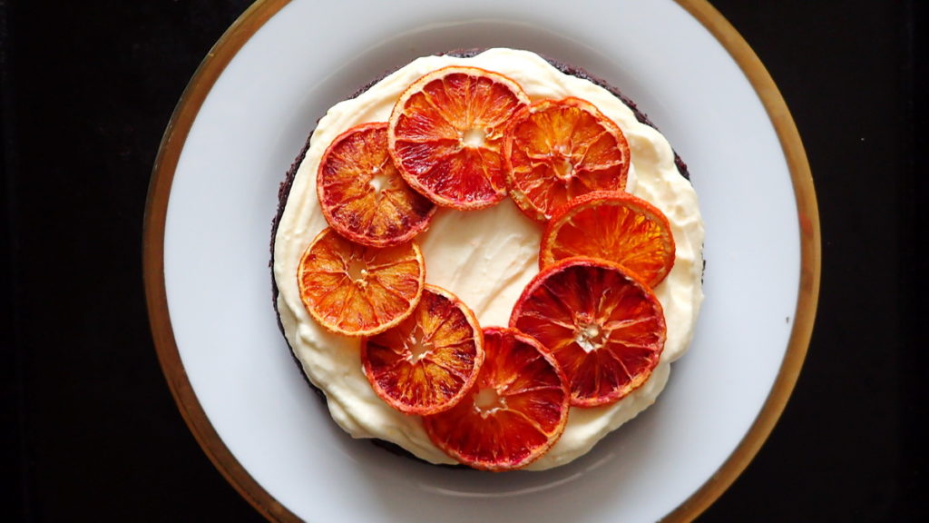 Orange Chocolate Cake with White Chocolate Cream Cheese Frosting and Dried orange segments