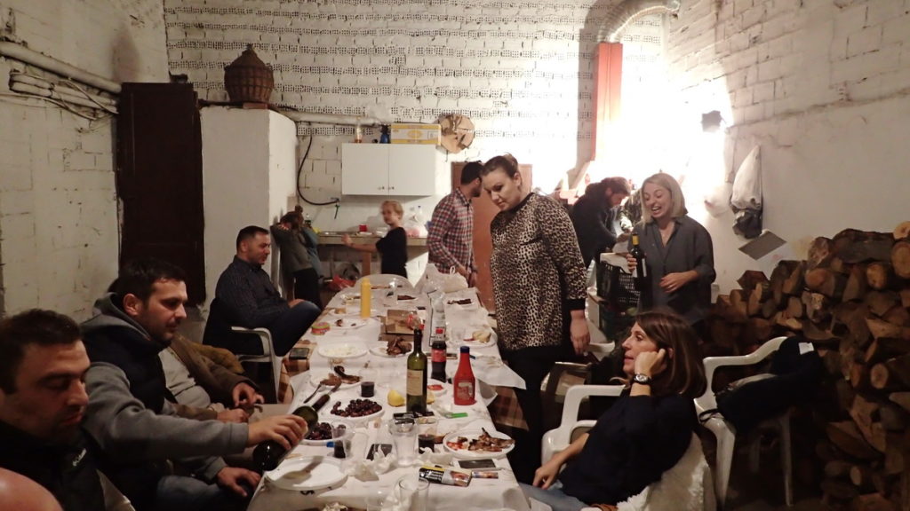 Friends gather beside the still for casual feast at a Kazani to flow.