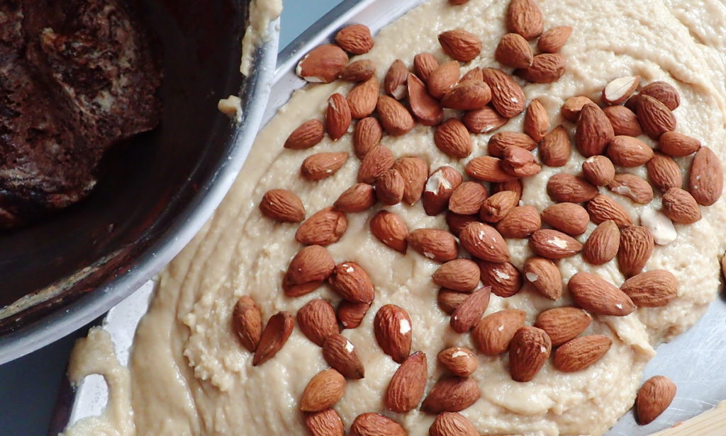 Cocoa halva and tahini halva with toasted almonds