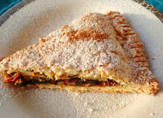 A slice of tourte aux blettes with sugar and cinnamon