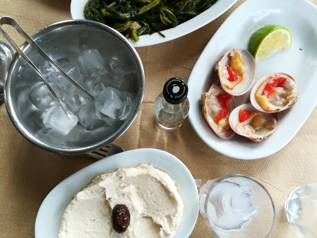 Sweet and succulent fresh clams and taramosalata with tsipouro at Demiris, Volos