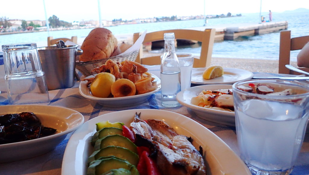 Smoked "skoubri" (makrel), gilled octopus, and fried calamari with tsipouro