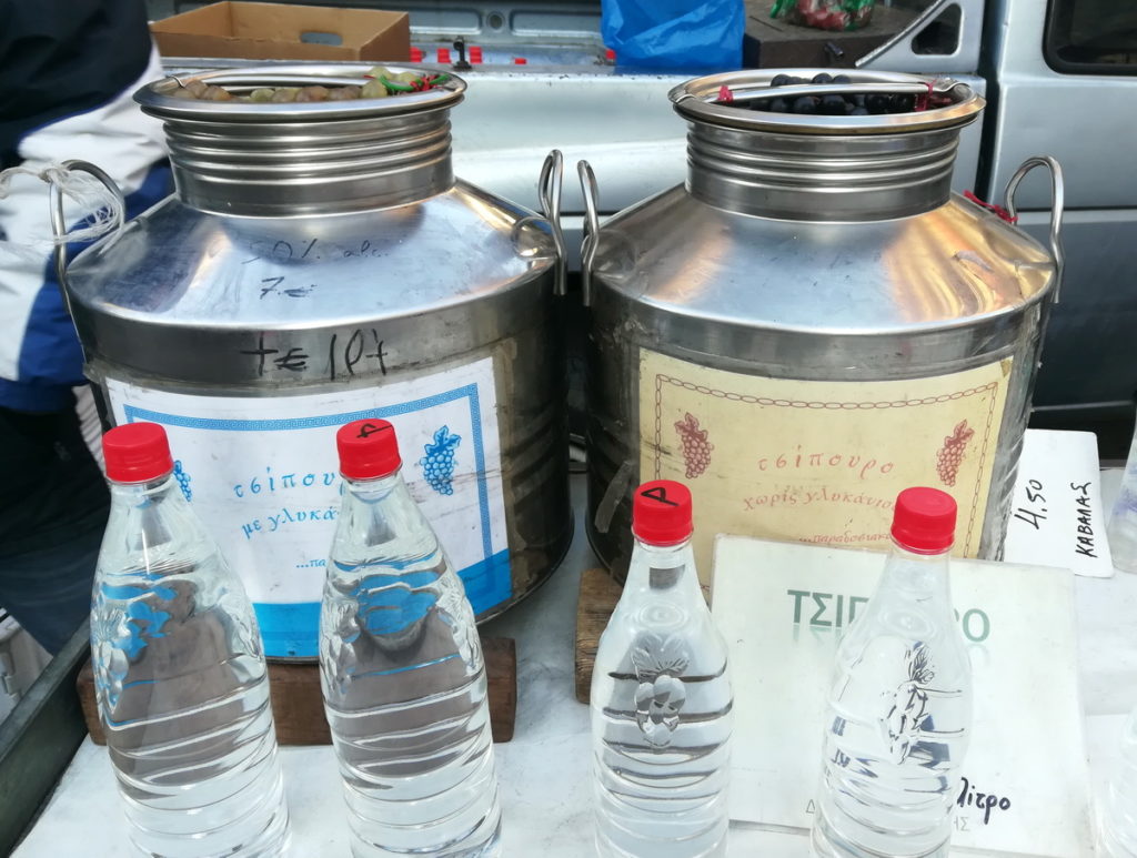 Tsipouro straight from the producer at a weekly farmers' market in Thessaloniki