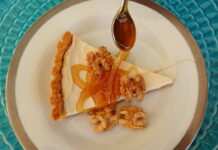 Honey Yogurt Tart sreved with a thick drozzle of honey and shelled walnuts